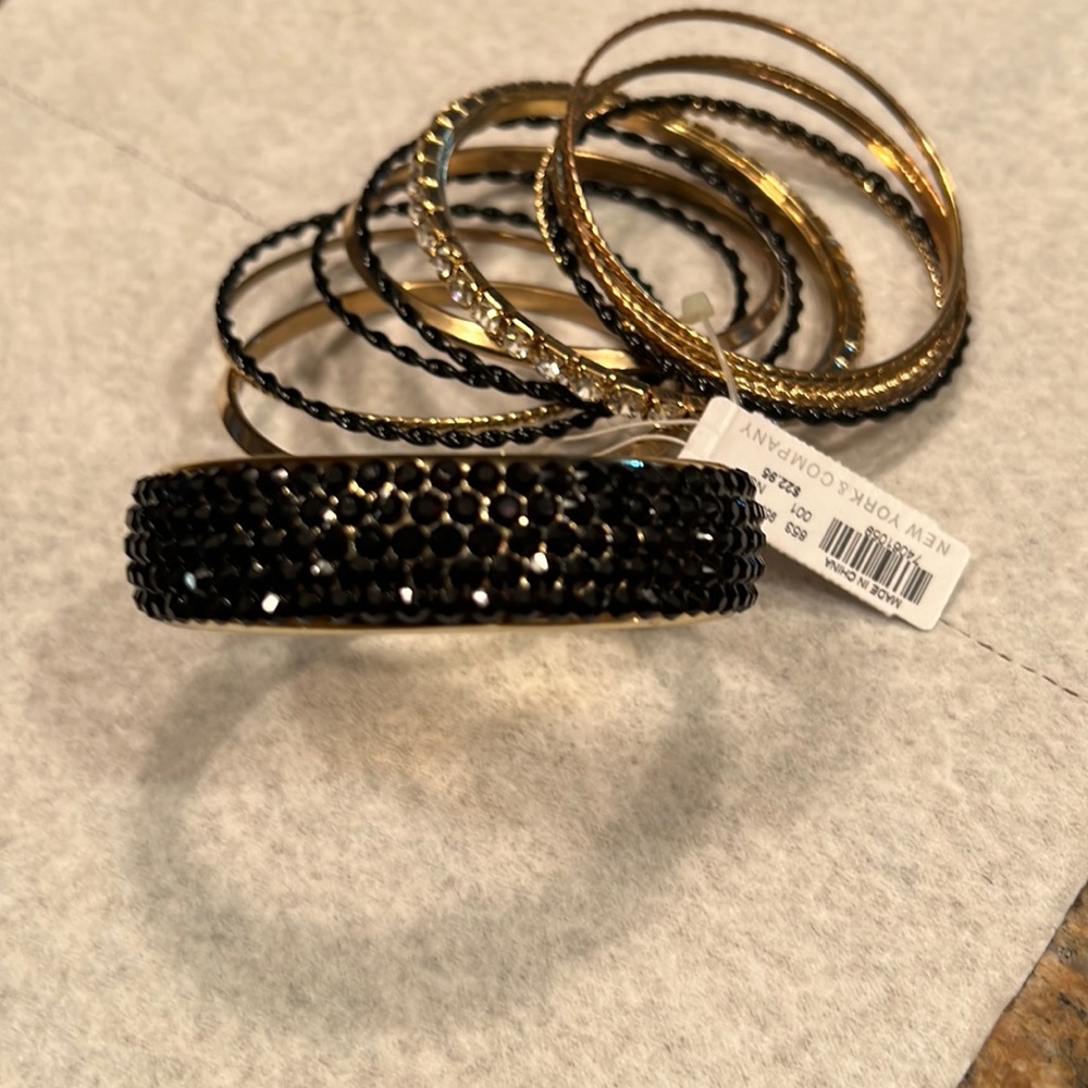 Bracelets black beaded and gold bangles